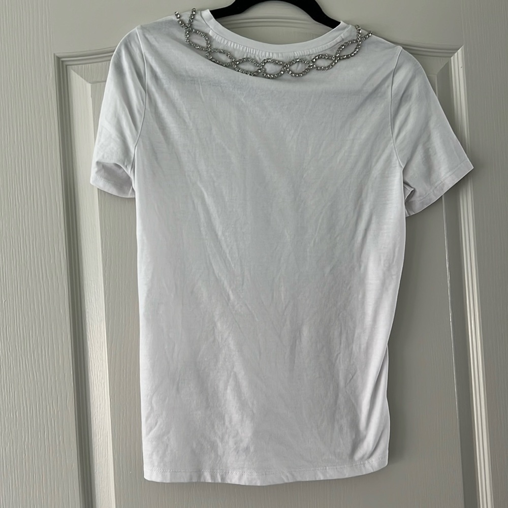 White sparkly blouse